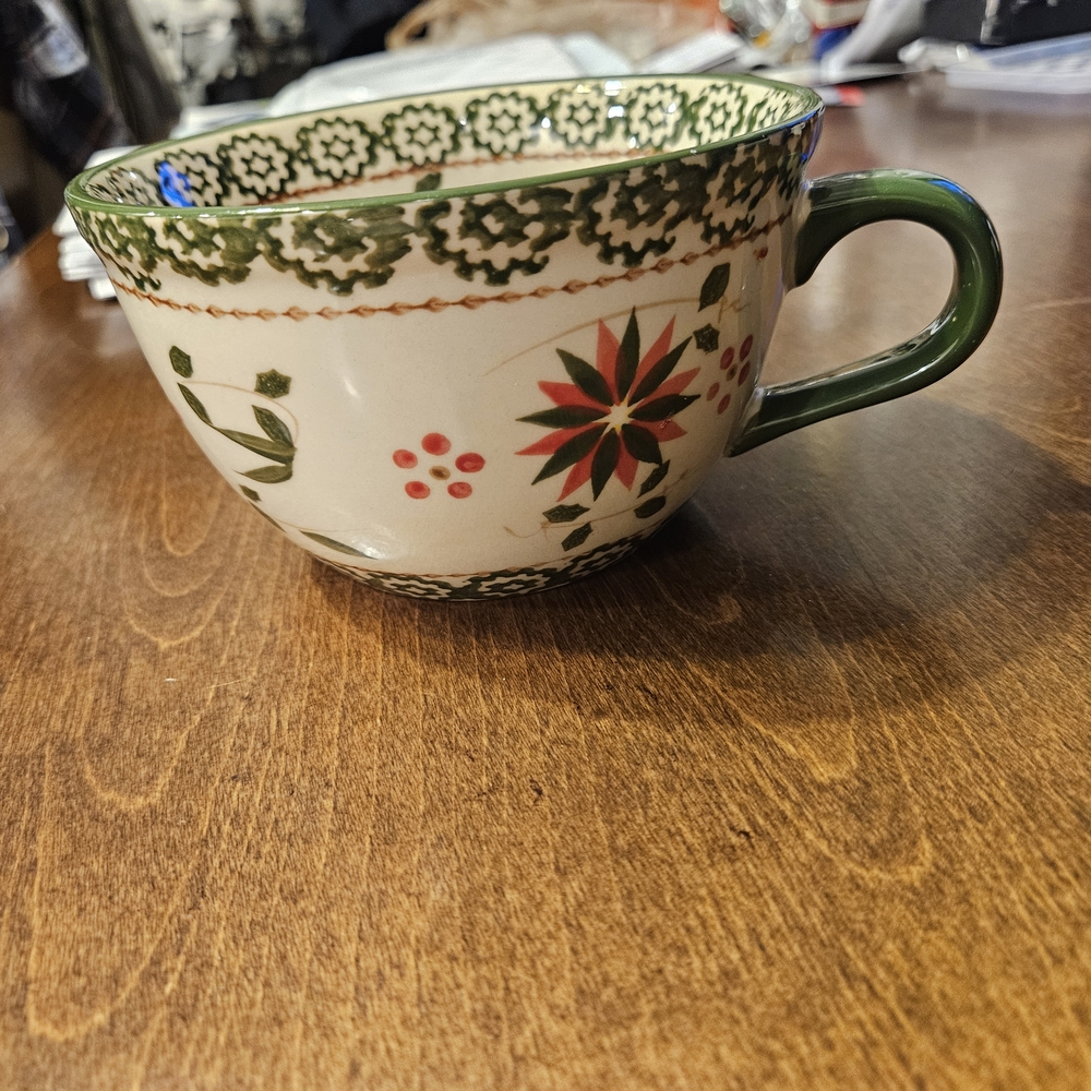 Temptations by old world mug and saucer